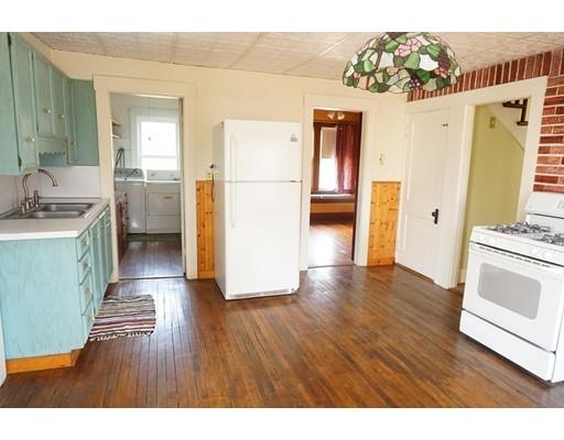 12 North Brookfield Road Barre, MA 01005 - Photo 5 of 30 a view of a kitchen with wooden floor and electronic appliances