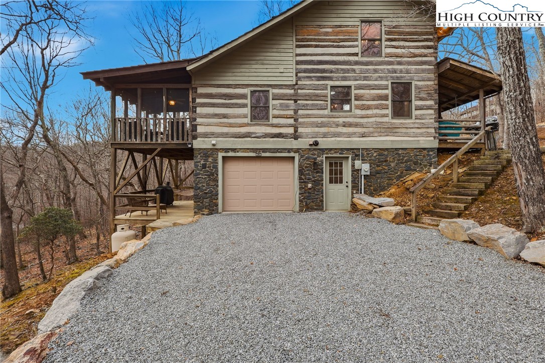 1411 Homestead Road Todd, NC 28684 - Photo 35 of 42 a front view of house with a yard
