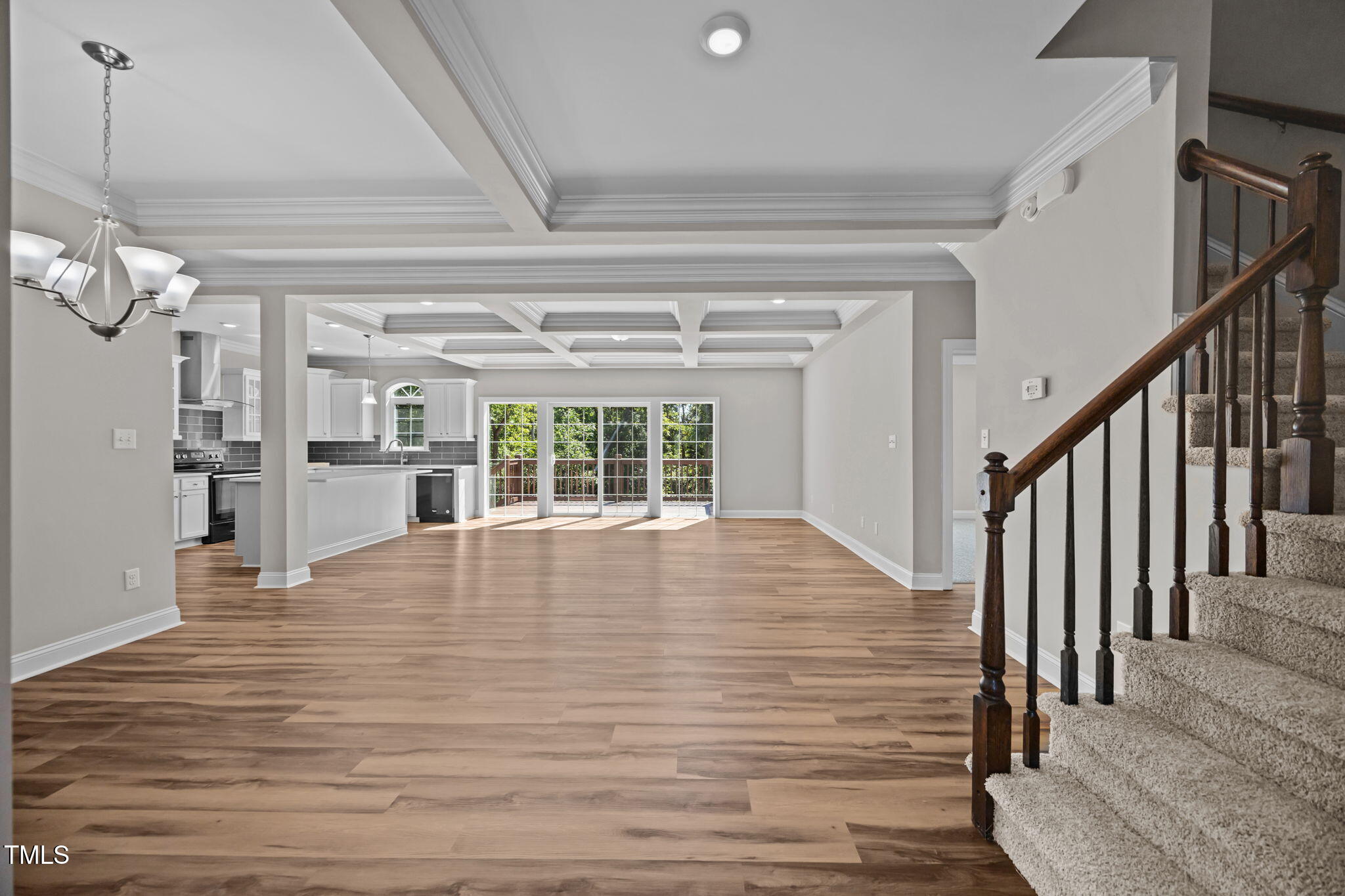 6117 David Moore Road Burlington, NC 27217 - Photo 12 of 51 Entry open to living room with coffered ceiling.