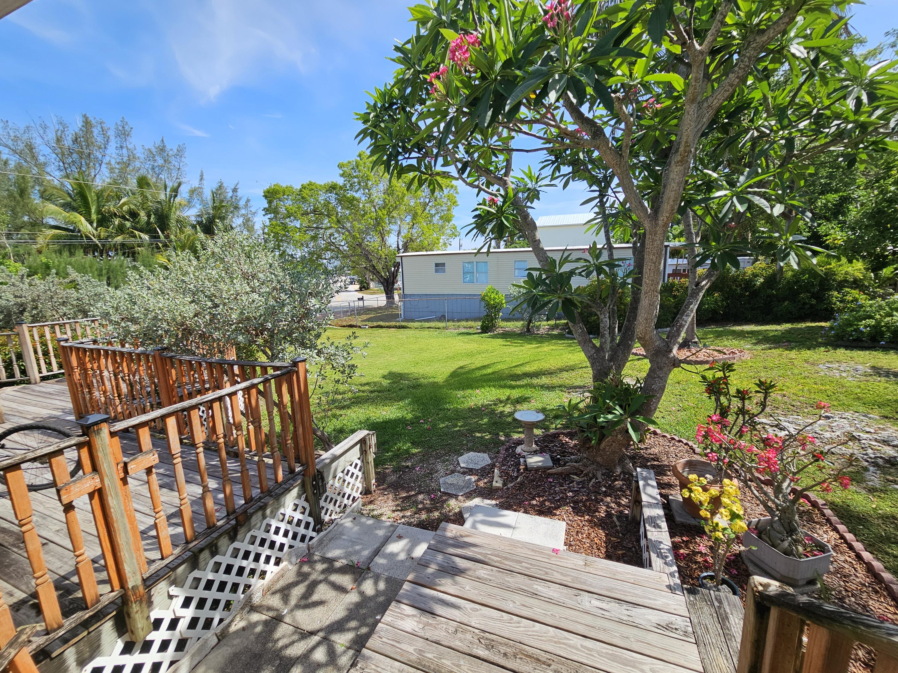 917 Plantation Road Key Largo, FL 33037 - Photo 1 of 31 Access to Yard