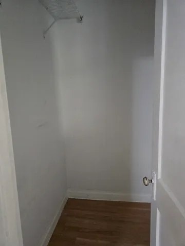 a view of small space with racks on the wall