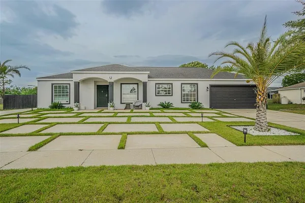 a view of a house with entertaining space