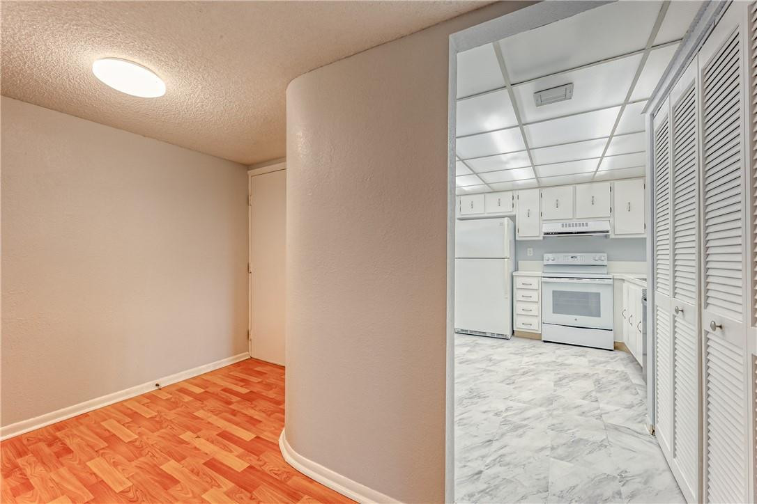 3900 Inverrary Boulevard, Unit E2 Lauderhill, FL 33319 - Photo 13 of 45 a view of a room with a bed