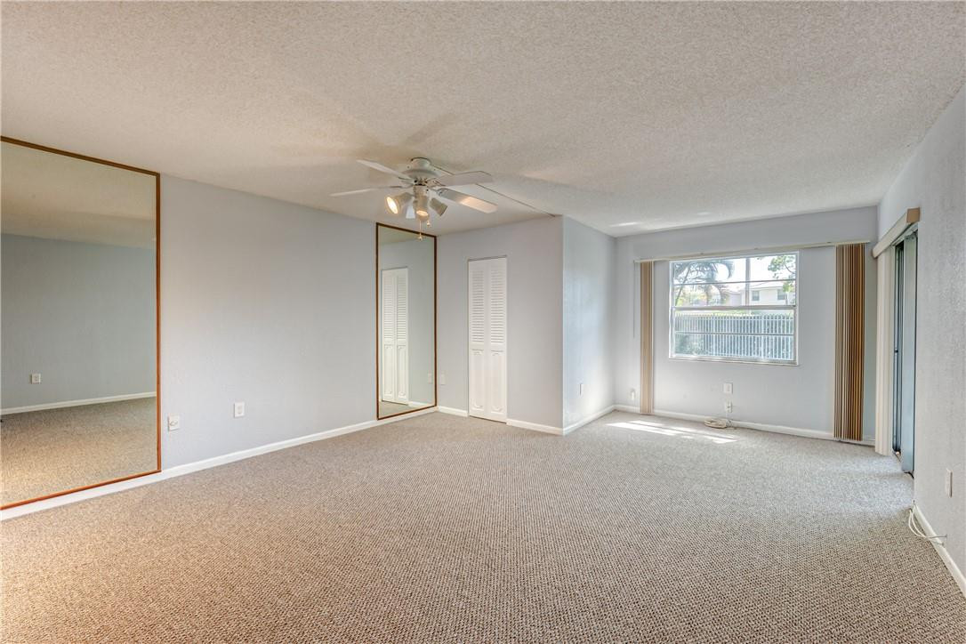 3900 Inverrary Boulevard, Unit E2 Lauderhill, FL 33319 - Photo 20 of 45 a view of an empty room with a window