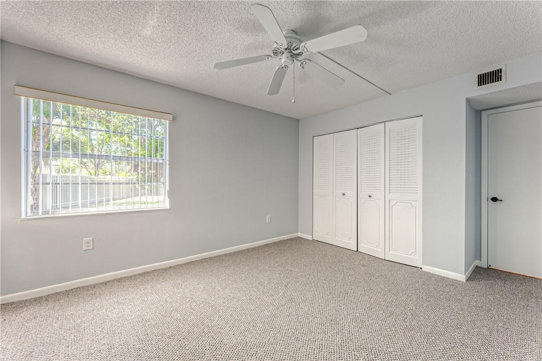 3900 Inverrary Boulevard, Unit E2 Lauderhill, FL 33319 - Photo 30 of 45 a view of an empty room with a window
