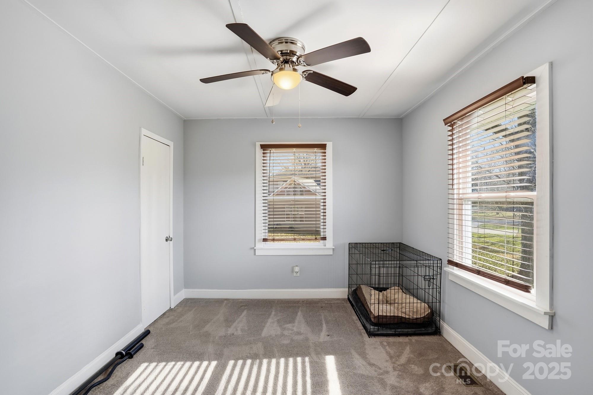 910 Roosevelt Street Badin, NC 28001 - Photo 17 of 30 a living room with furniture and a window