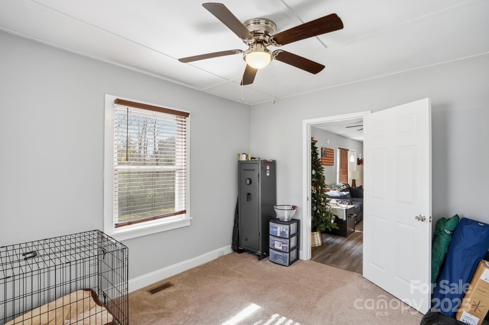 910 Roosevelt Street Badin, NC 28001 - Photo 18 of 30 a view of a livingroom with a workspace