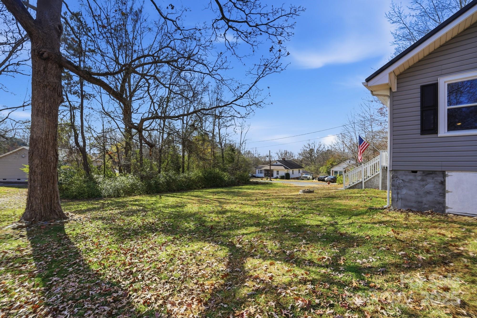 910 Roosevelt Street Badin, NC 28001 - Photo 7 of 30 a view of a backyard