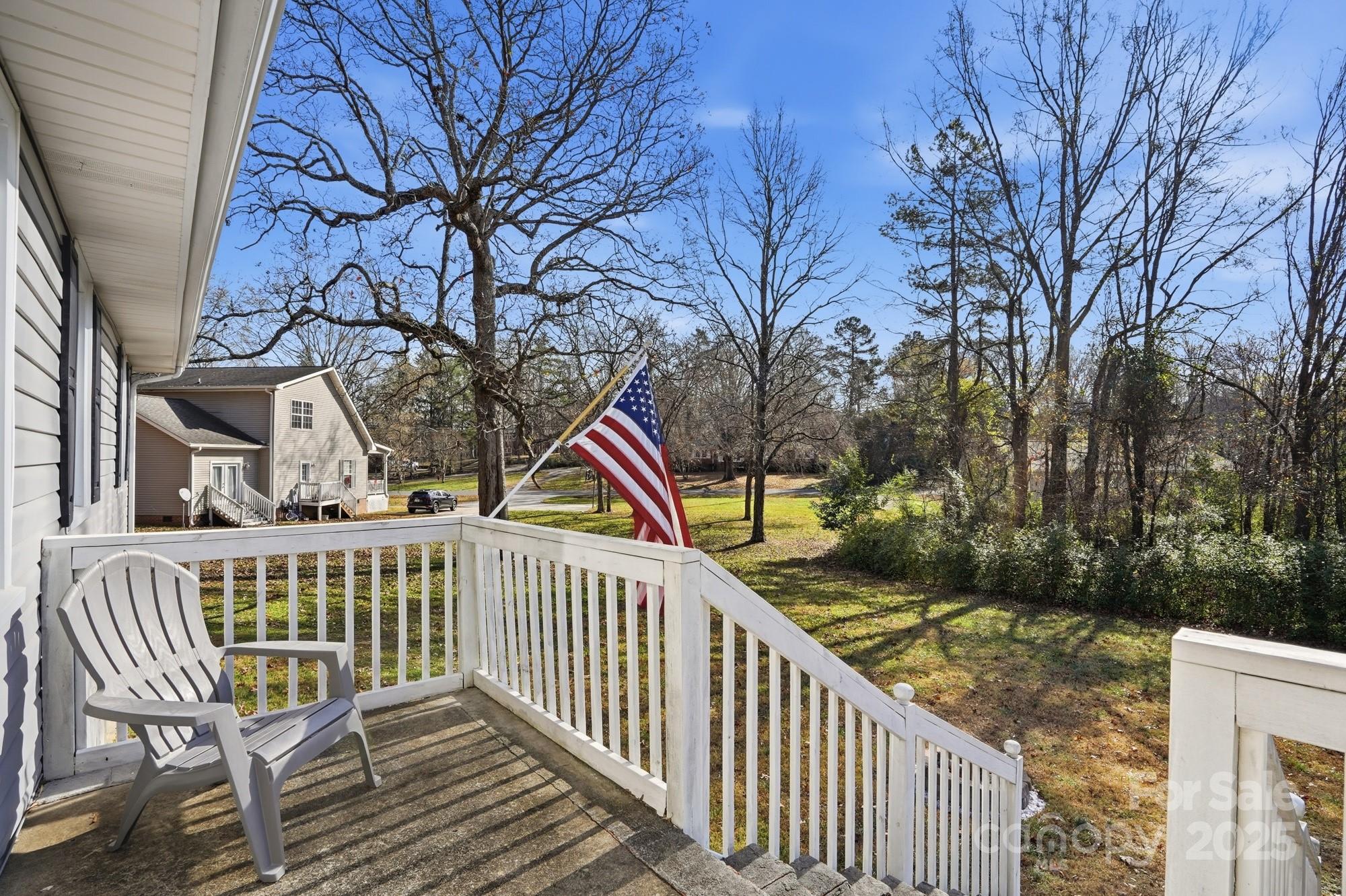 910 Roosevelt Street Badin, NC 28001 - Photo 8 of 30 a view of a house with backyard and sitting area
