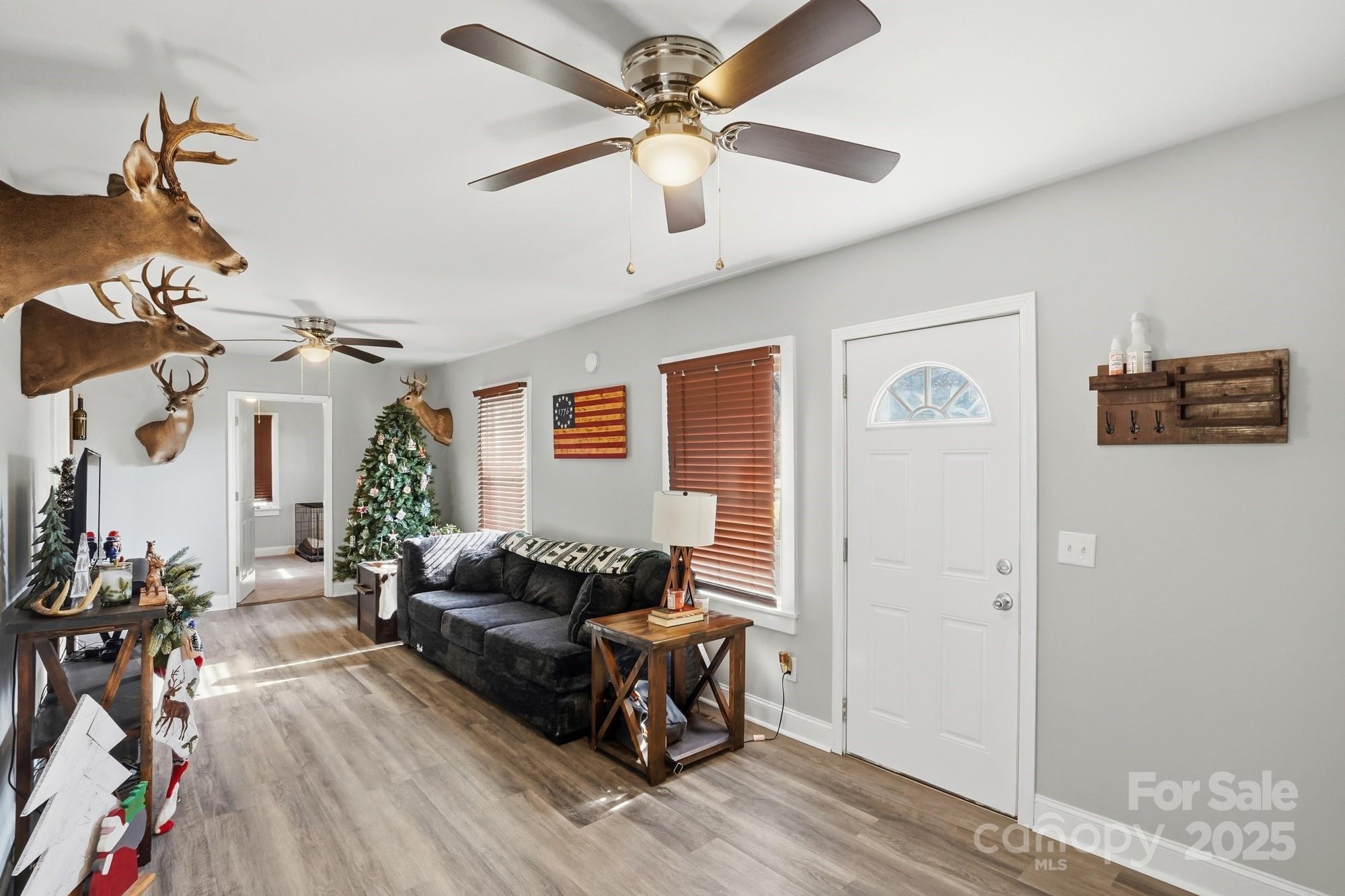 910 Roosevelt Street Badin, NC 28001 - Photo 10 of 30 a living room with furniture and wooden floor