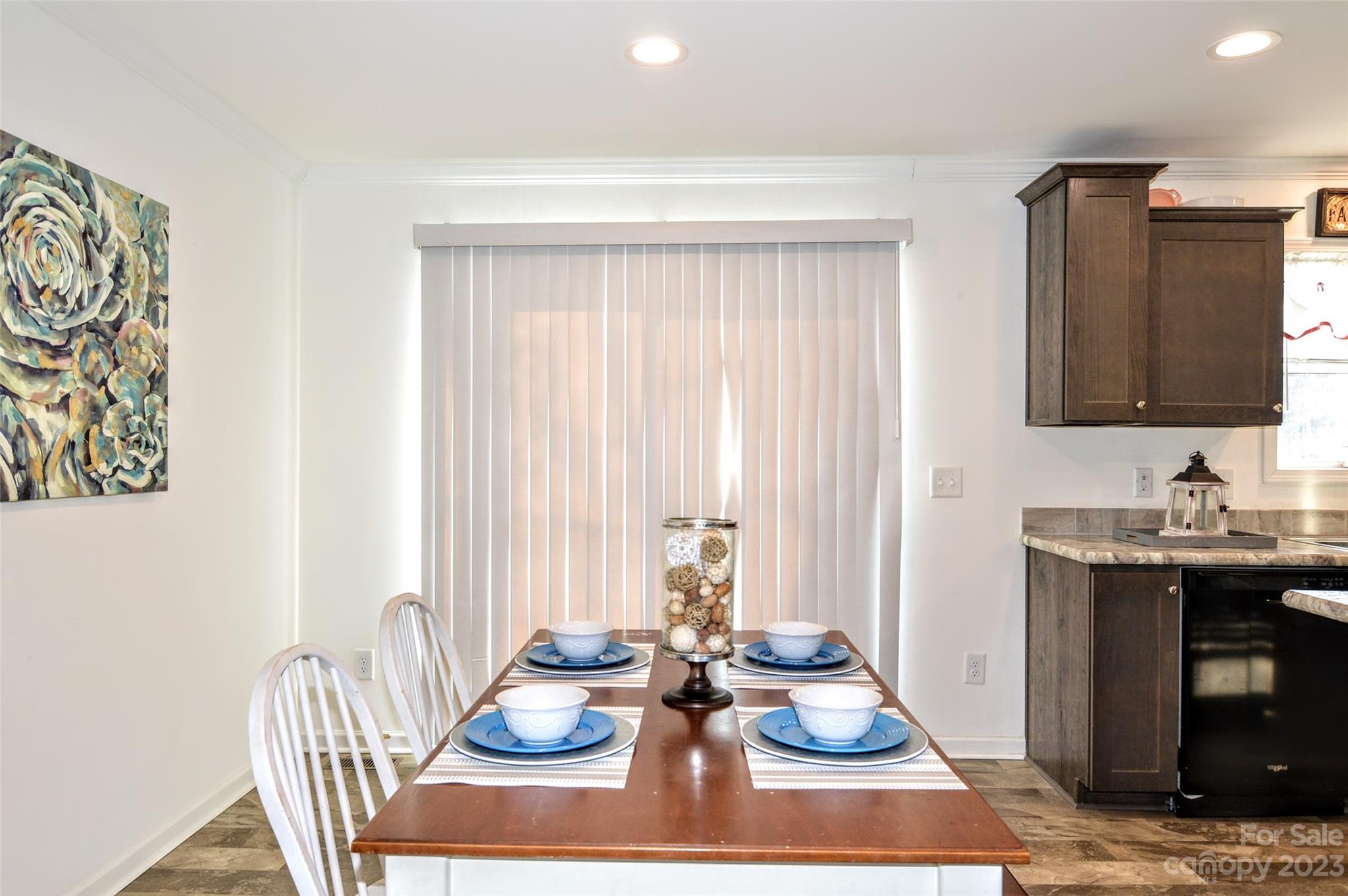 5717 Griffith Road Monroe, NC 28112 - Photo 21 of 48 a view of a dining room with furniture window and outside view