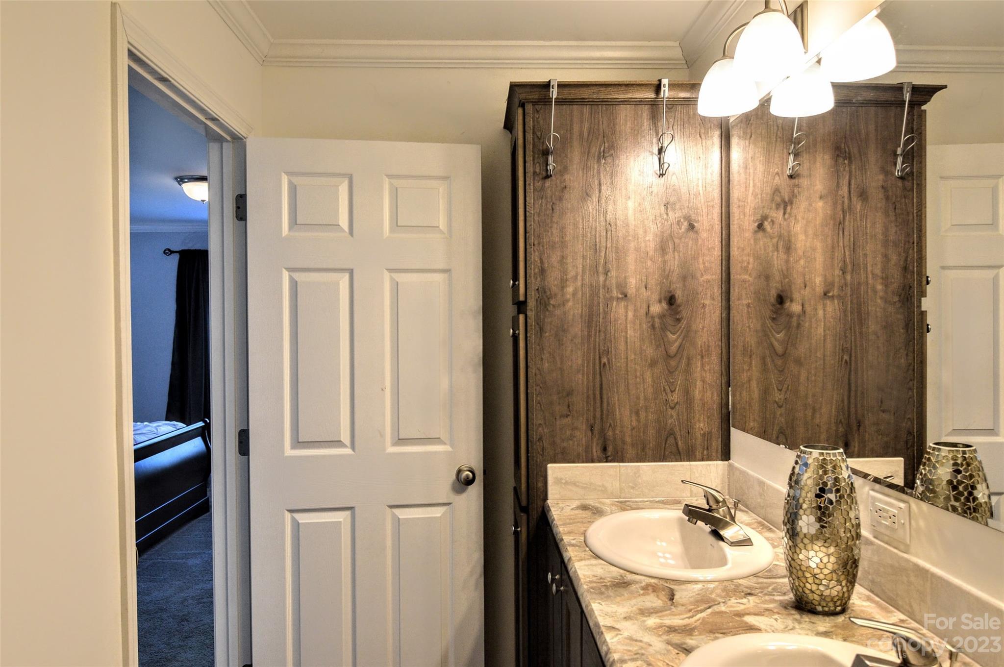5717 Griffith Road Monroe, NC 28112 - Photo 29 of 48 a bathroom with a sink vanity granite tub and shower