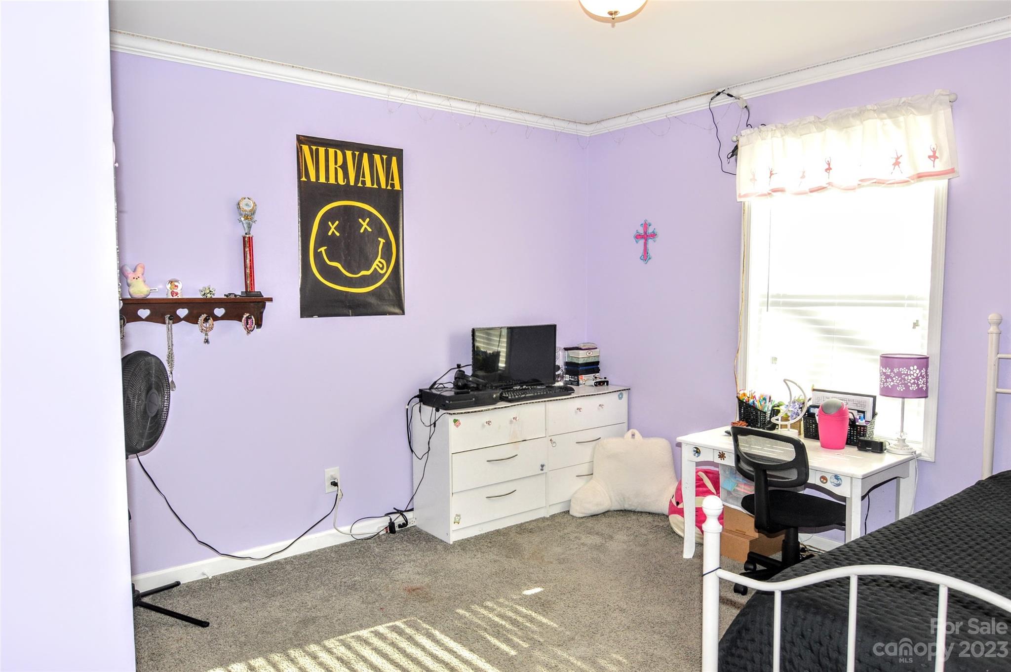 5717 Griffith Road Monroe, NC 28112 - Photo 30 of 48 a dining room with a stove and a window