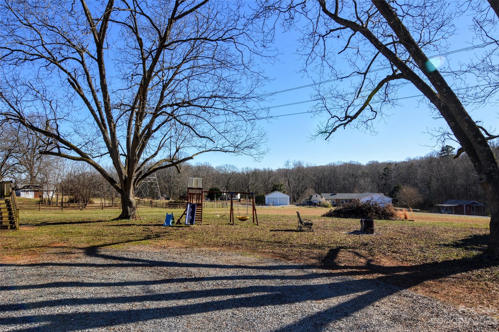 5717 Griffith Road Monroe, NC 28112 - Photo 41 of 48 a view of a yard with cars parked