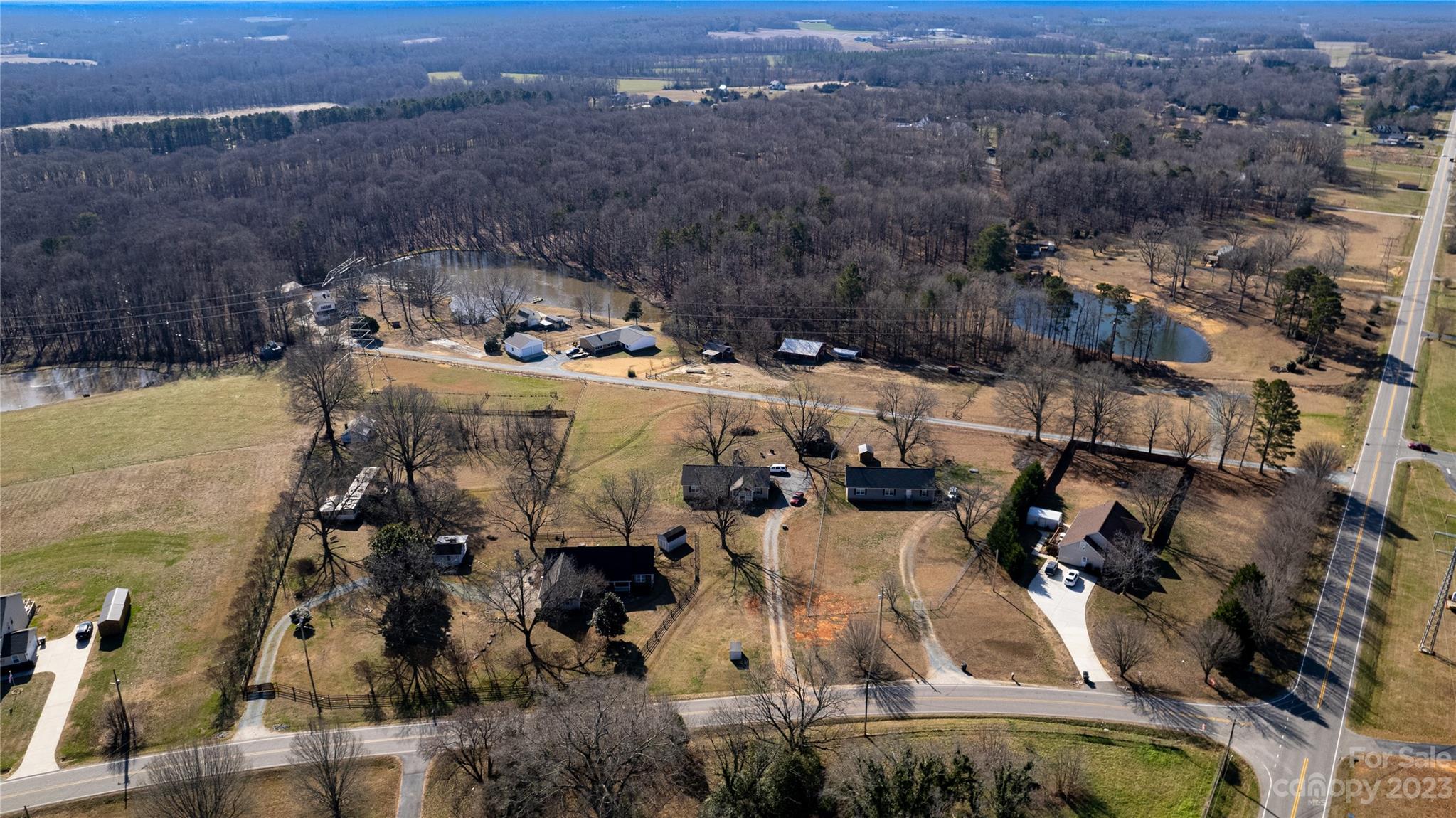 5717 Griffith Road Monroe, NC 28112 - Photo 47 of 48 an aerial view of a house with a swimming pool