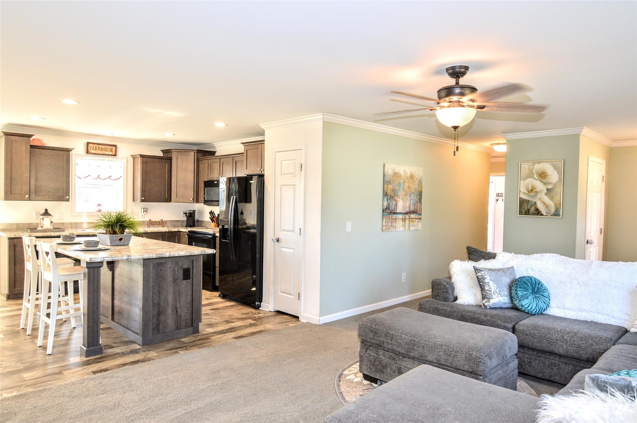 5717 Griffith Road Monroe, NC 28112 - Photo 8 of 48 a living room with stainless steel appliances kitchen island granite countertop furniture and a kitchen view