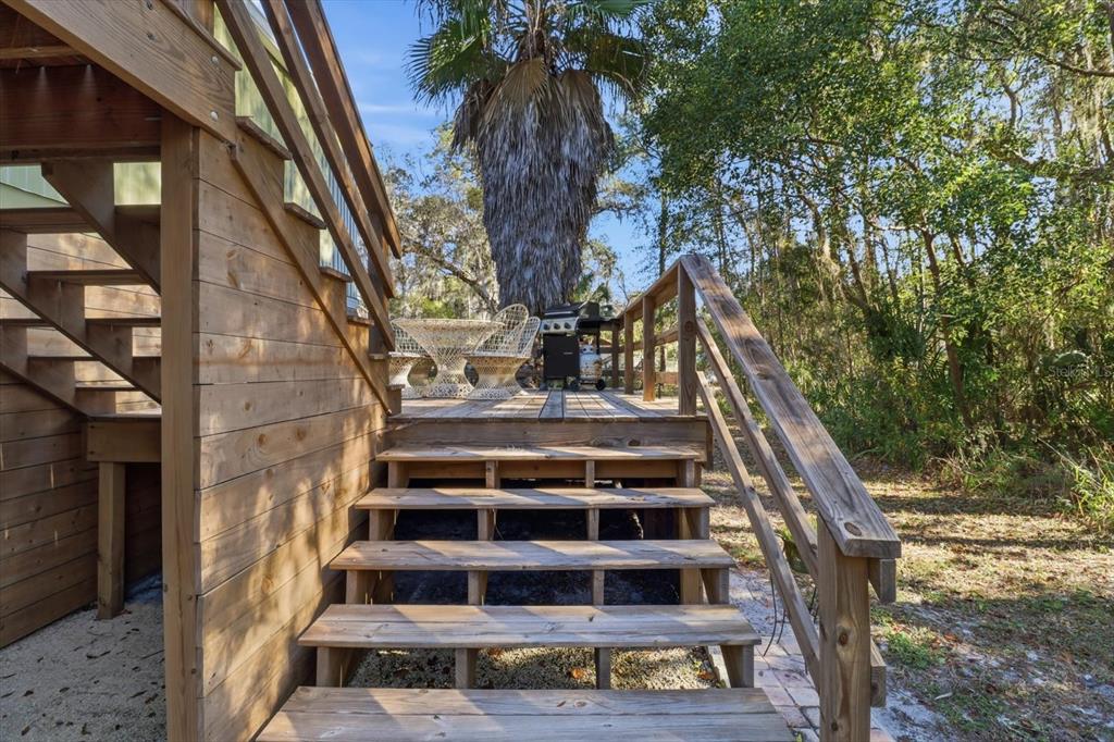 24 62nd Street Yankeetown, FL 34498 - Photo 4 of 5 a view of staircase with railing and white walls