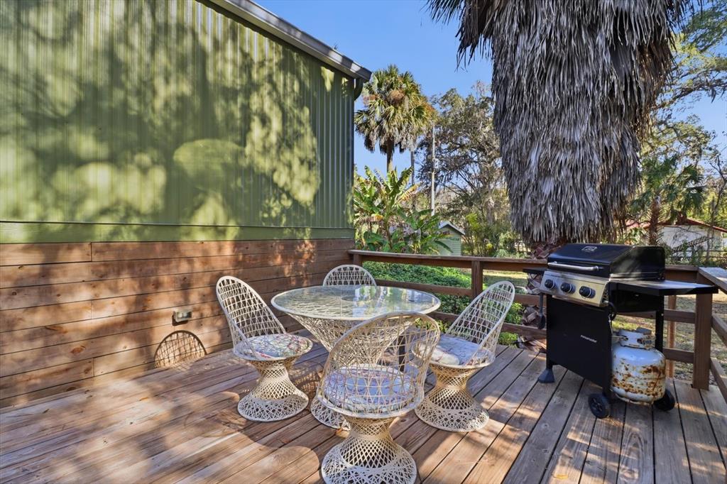 24 62nd Street Yankeetown, FL 34498 - Photo 5 of 5 a view of a balcony with two chairs and a table