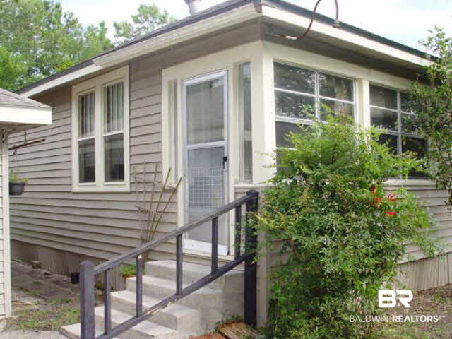 34205 West Barclay Avenue Lillian, AL 36549 - Photo 32 of 46 Enclosed back porch