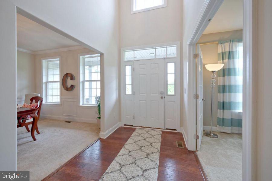 2617 County Line Road Chalfont, PA 18914 - Photo 18 of 40 a view of a hallway with furniture and windows
