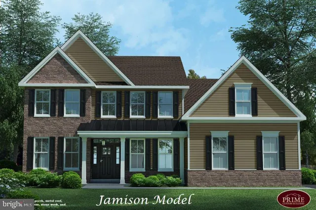 a view of a house with yard and plants