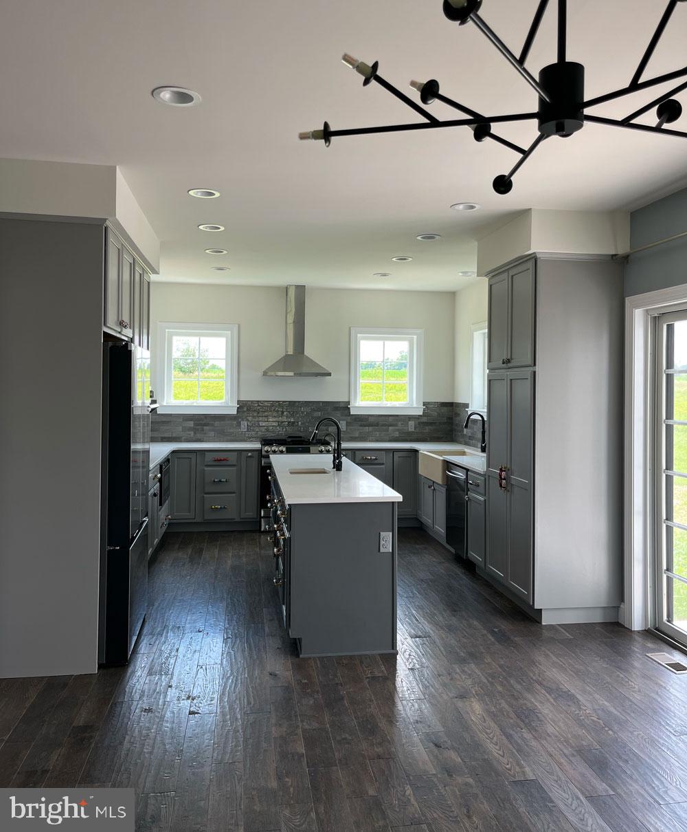 2617 County Line Road Chalfont, PA 18914 - Photo 33 of 40 a kitchen with a refrigerator and a sink