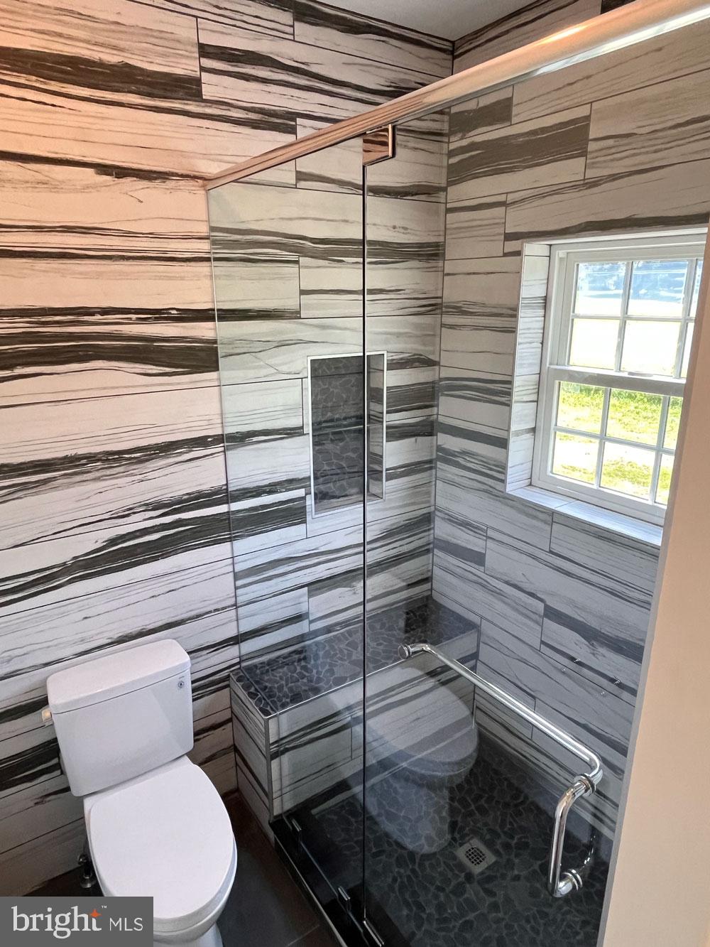 2617 County Line Road Chalfont, PA 18914 - Photo 37 of 40 a bathroom with a toilet and a shower