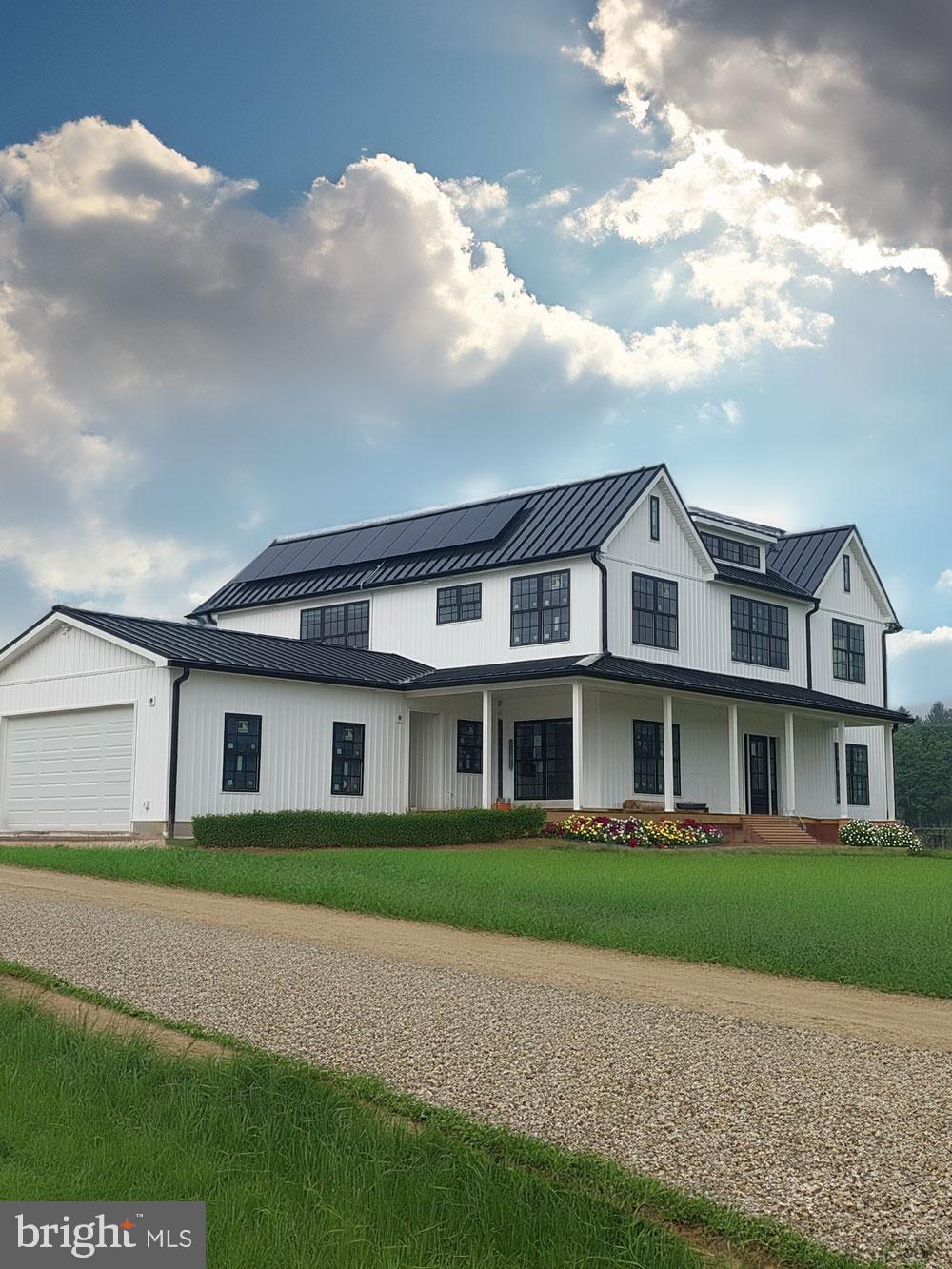 2617 County Line Road Chalfont, PA 18914 - Photo 8 of 40 a front view of a house with a garden and yard