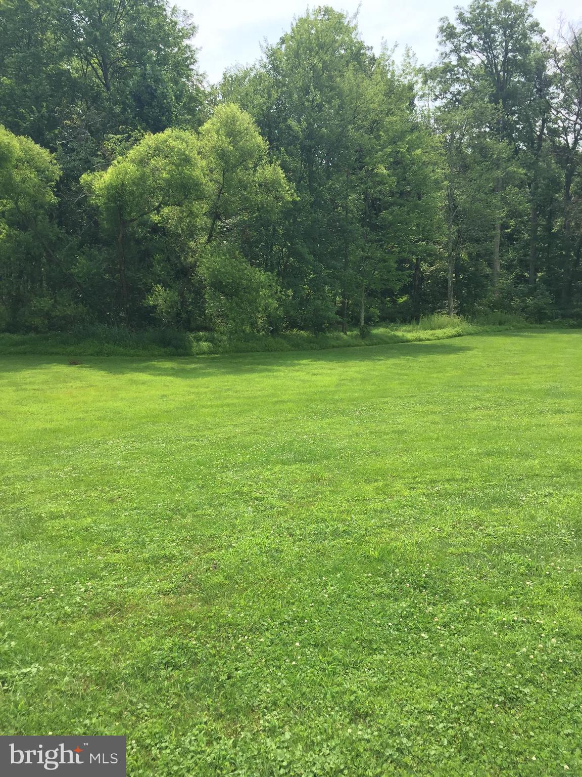 2617 County Line Road Chalfont, PA 18914 - Photo 10 of 40 a view of a field with a trees