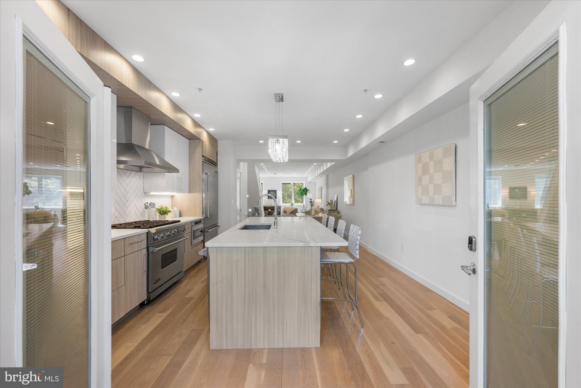 2315 Ontario Road Northwest, Unit 2 Washington, DC 20009 - Photo 4 of 25 Gourmet Kitchen with Island / Outside Deck Access