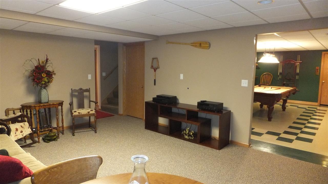 2835 Dourdan Road Belvidere, IL 61008 - Photo 20 of 25 a living room with furniture and wooden floor