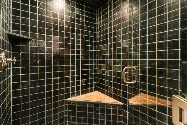 a bathroom with a sink a blue and blue walls