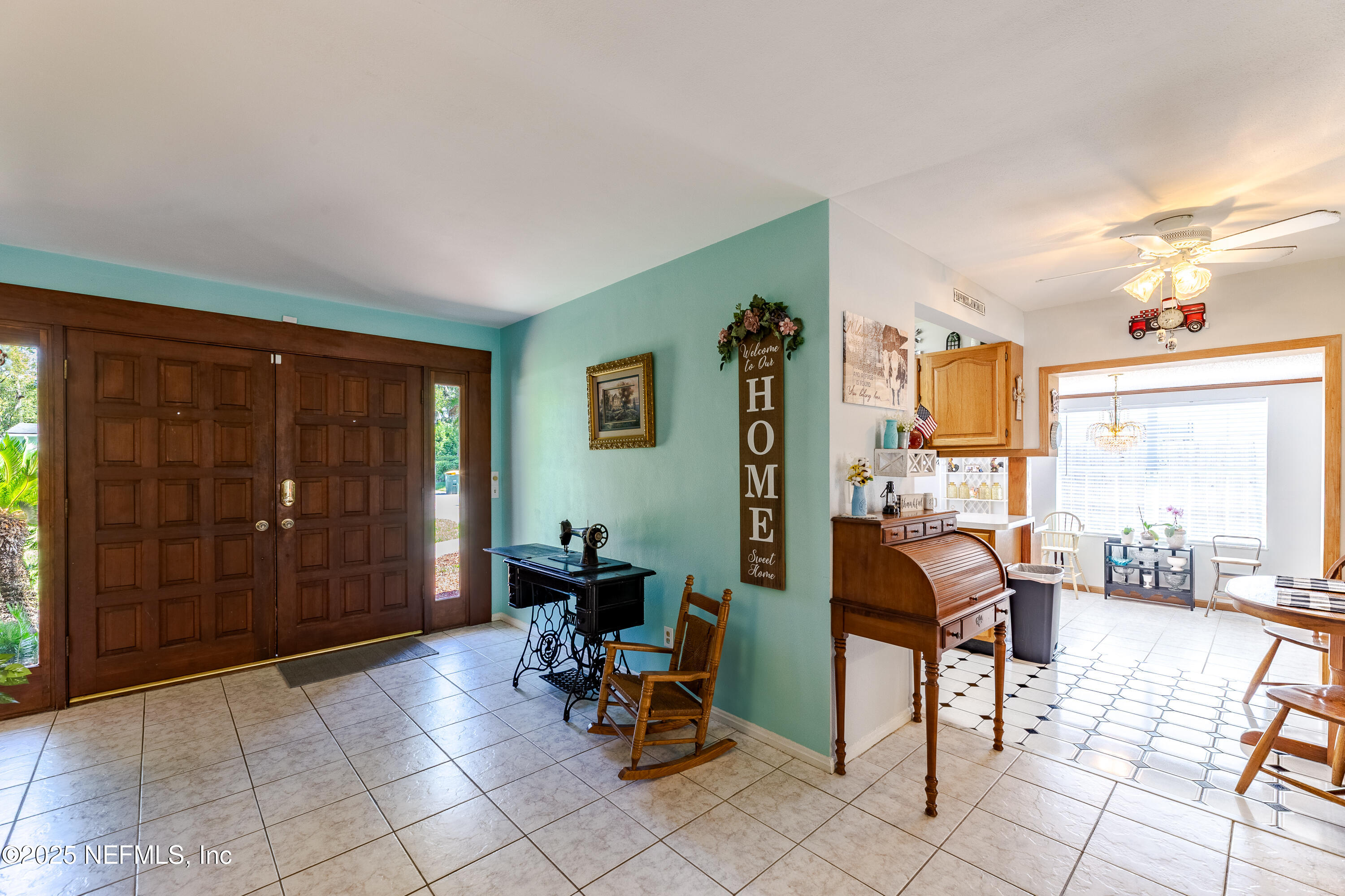 6542 Ovington Road South Jacksonville, FL 32216 - Photo 12 of 35 a living room with furniture and a window
