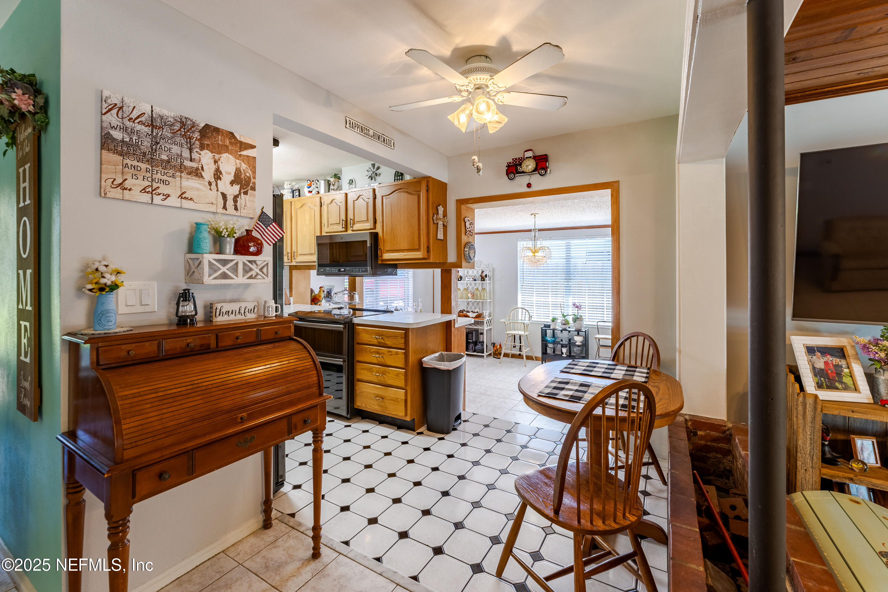 6542 Ovington Road South Jacksonville, FL 32216 - Photo 13 of 35 a view of a workspace with furniture and a window