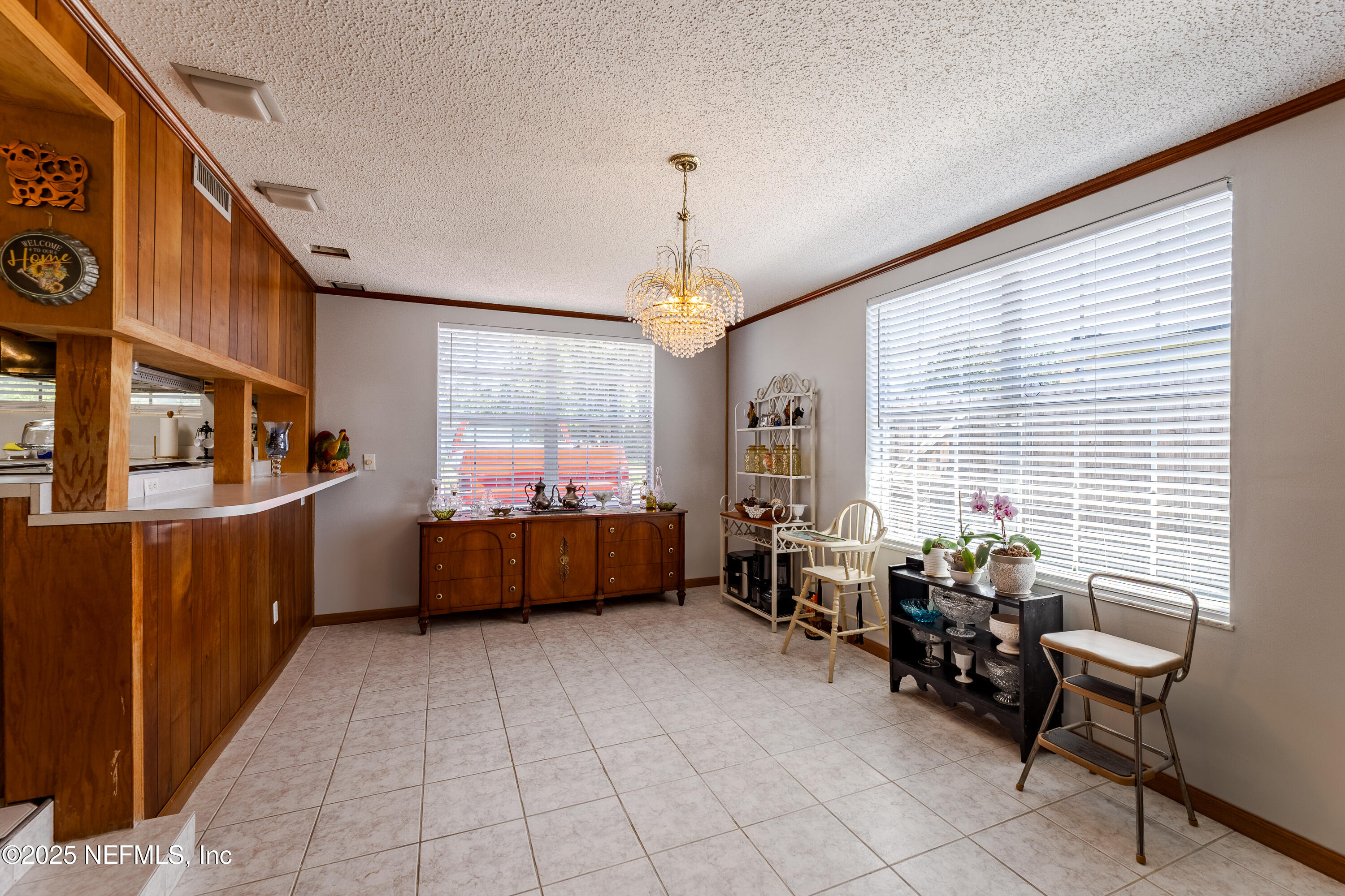 6542 Ovington Road South Jacksonville, FL 32216 - Photo 16 of 35 a room with furniture and window