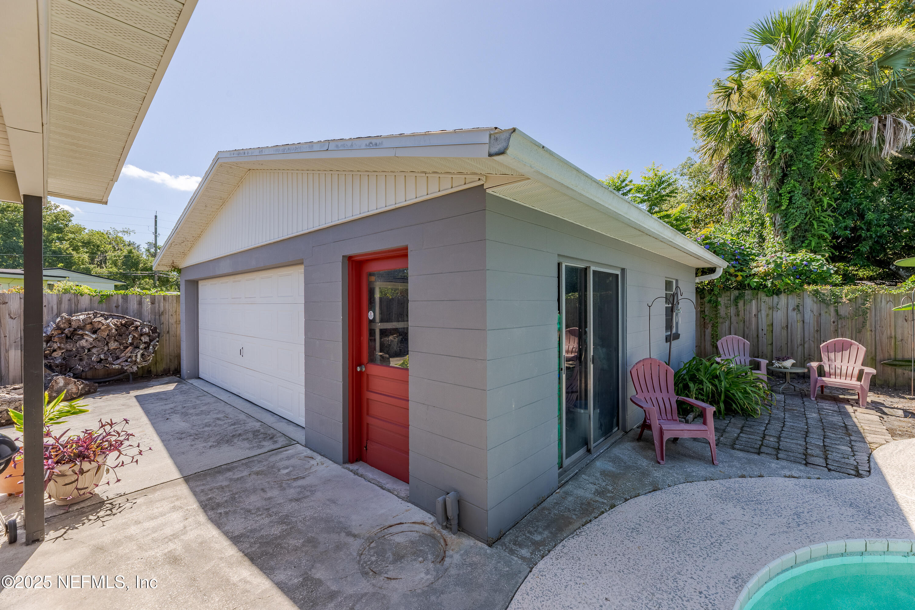 6542 Ovington Road South Jacksonville, FL 32216 - Photo 34 of 35 a view of backyard with outdoor seating and plants