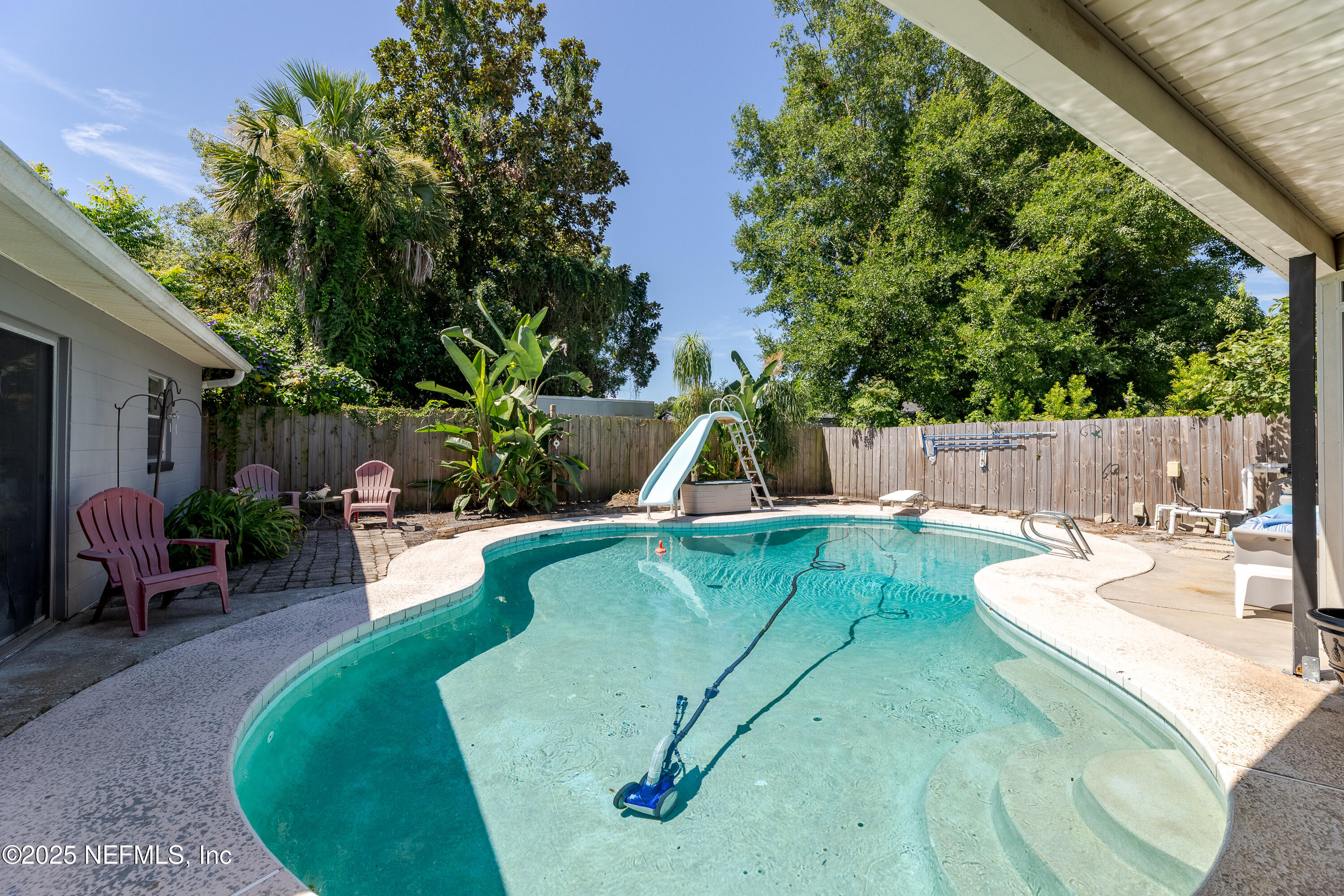 6542 Ovington Road South Jacksonville, FL 32216 - Photo 5 of 35 swimming pool view with a sitting space