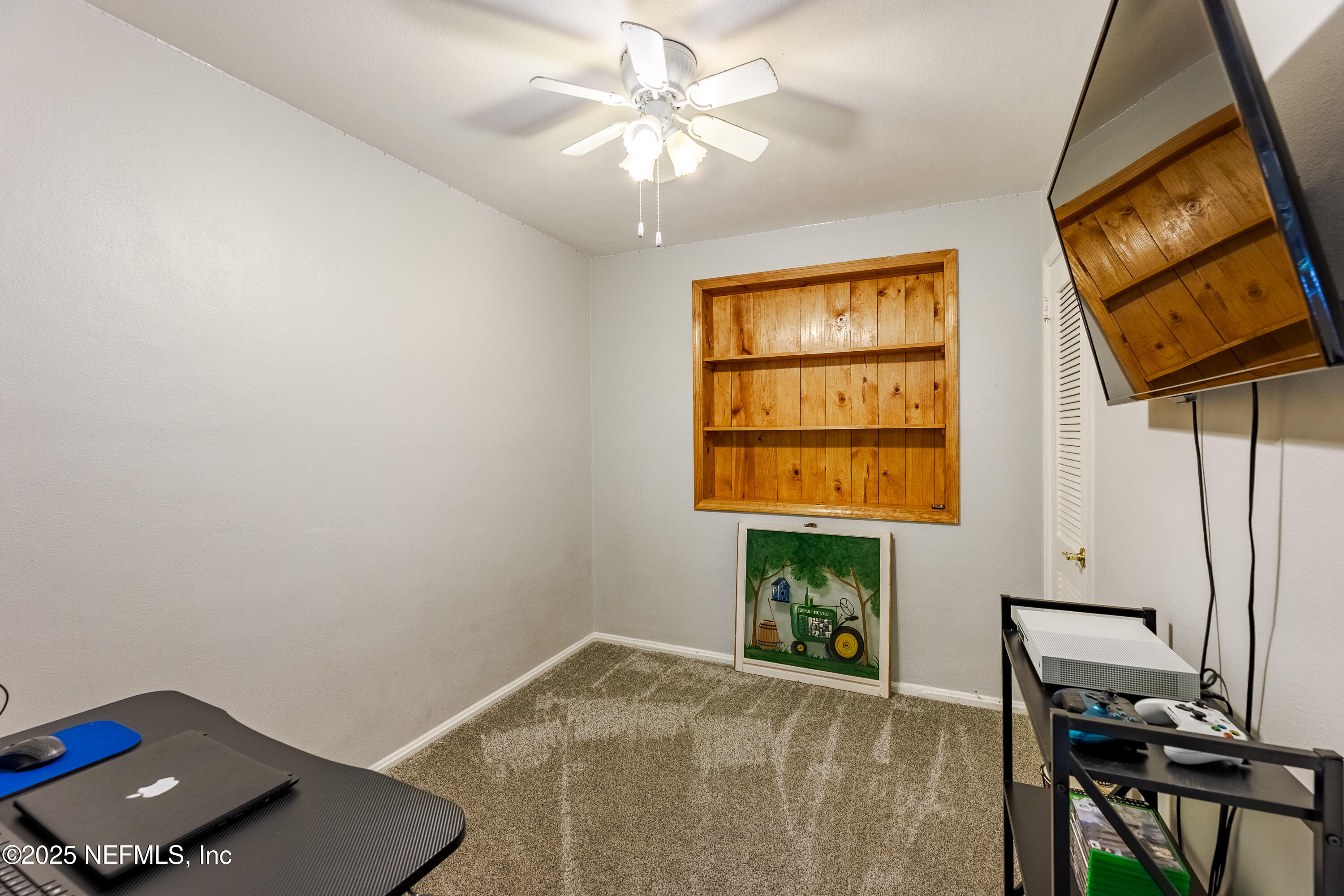 6542 Ovington Road South Jacksonville, FL 32216 - Photo 9 of 35 a workspace with furniture and window