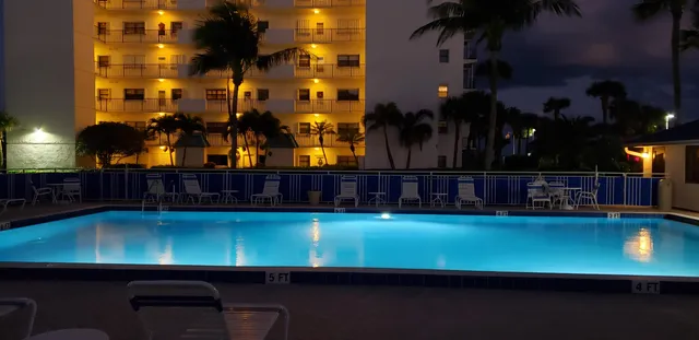 a sign that is next to a road