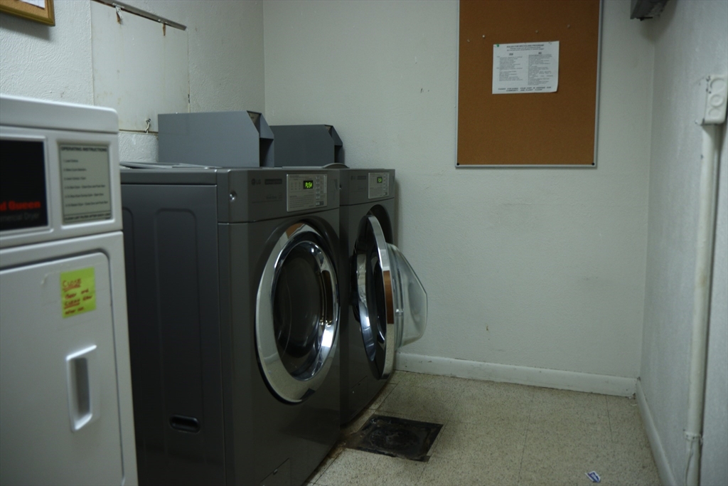 209 Great Road, Unit C3 Acton, MA 01720 - Photo 13 of 17 a utility room with dryer and washer
