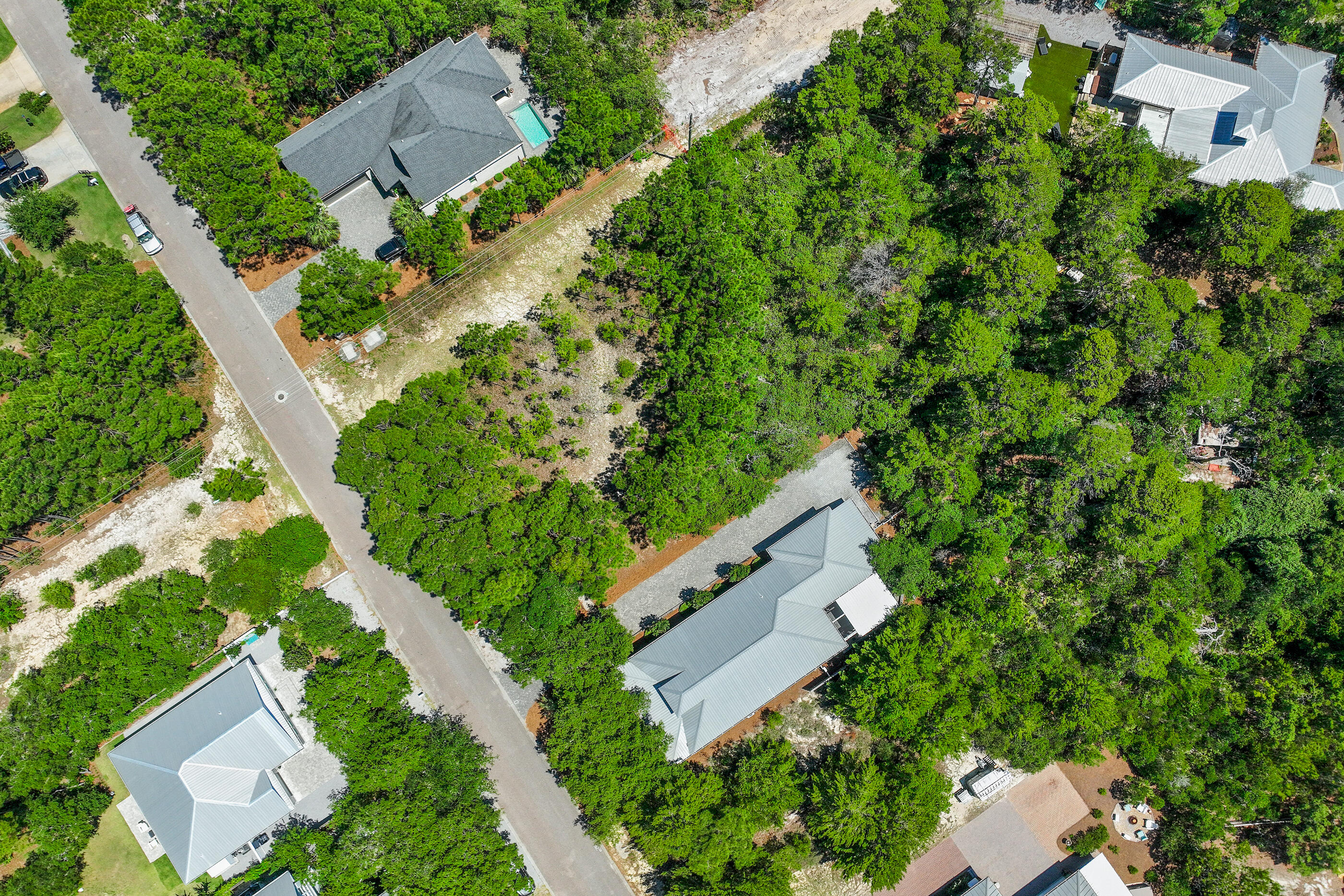 122 Spotted Dolphin Road Santa Rosa Beach, FL 32459 - Photo 5 of 11 an aerial view of a house with a yard