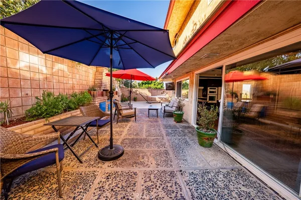 a view of outdoor space with chairs