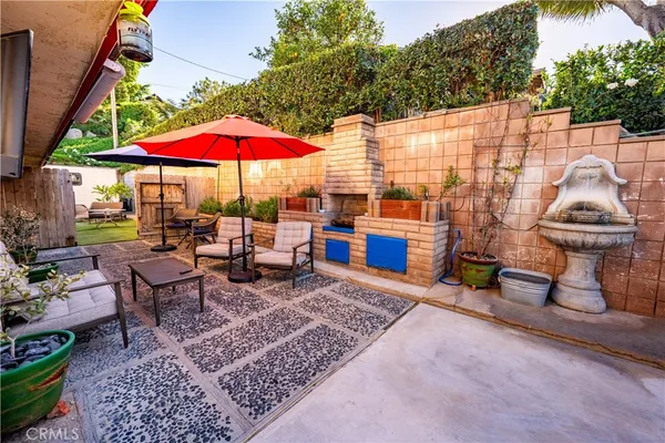 a view of a terrace with sitting area