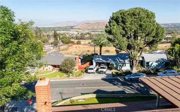an aerial view of a house with a garden