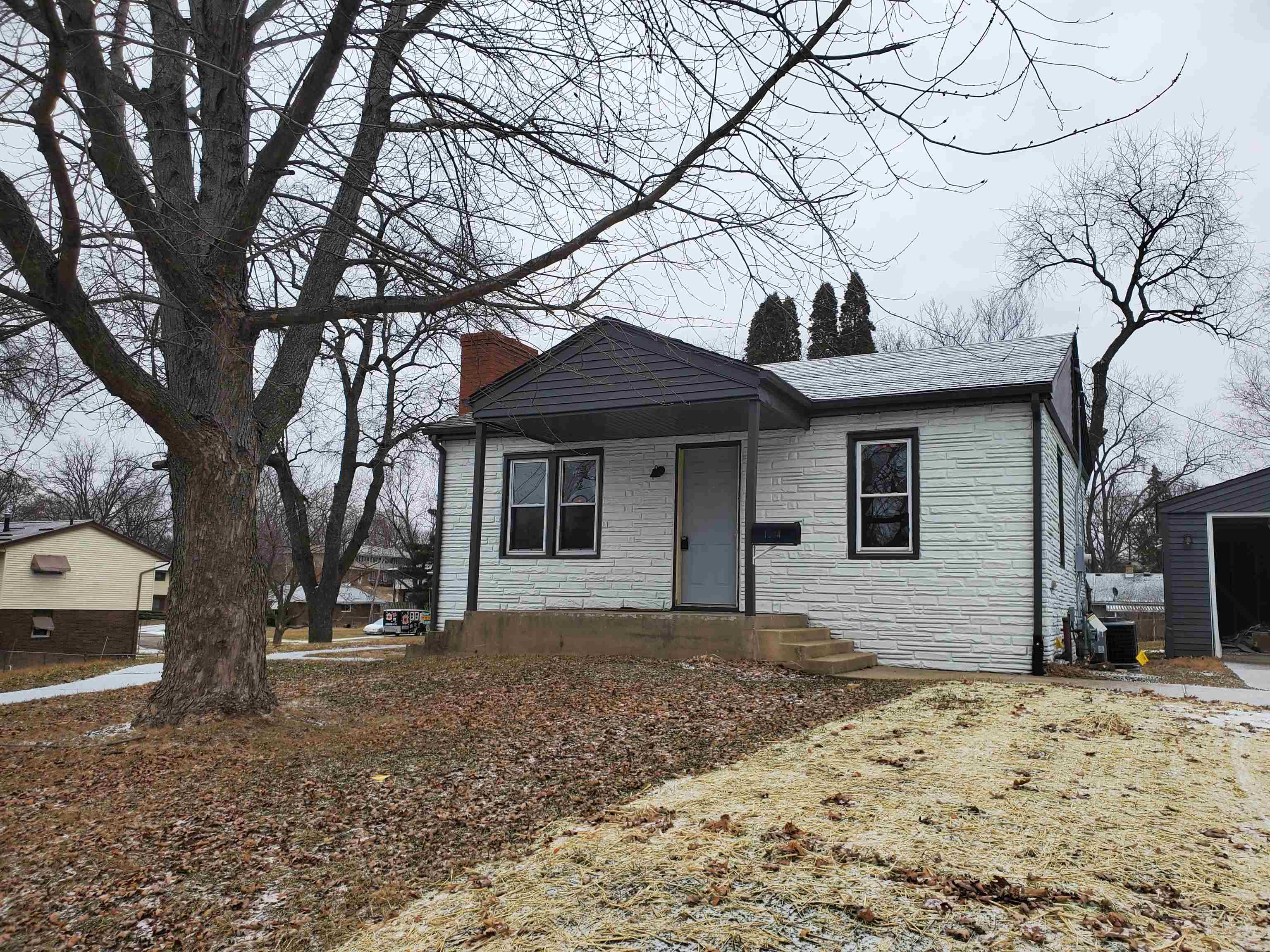 1804 Ridgeland Road Rockford, IL 61108 - Photo 2 of 22 a front view of a house with a yard