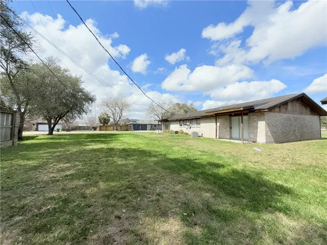 a view of backyard with green space