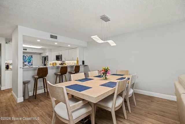 a view of a dining room with furniture