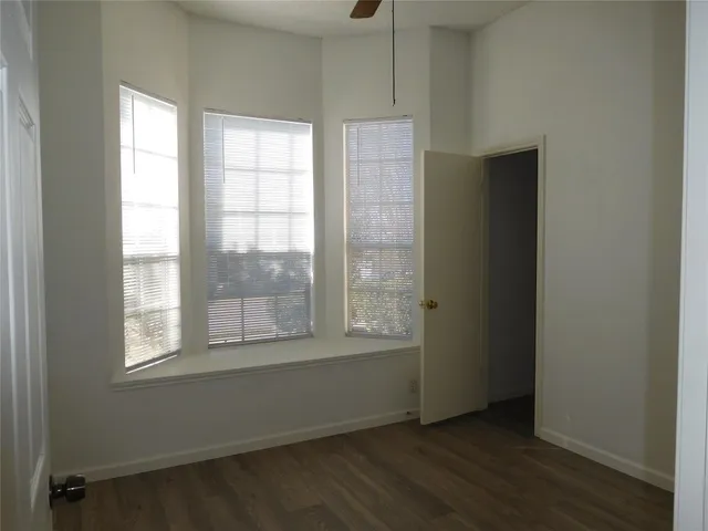 a bathroom with a sink a mirror and a toilet