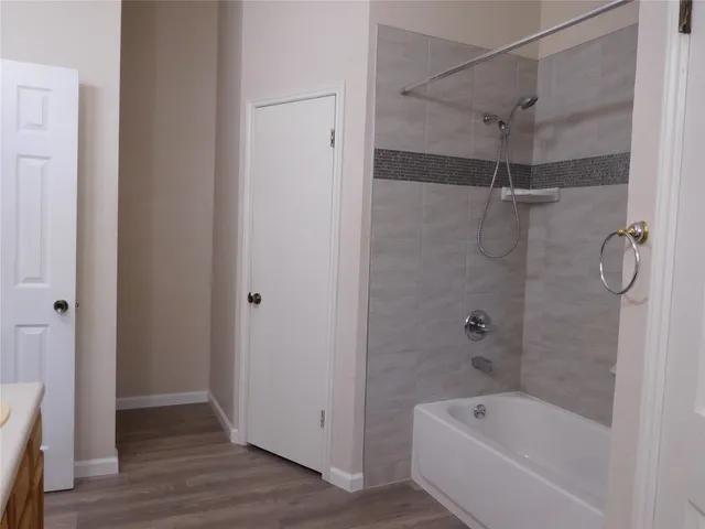 a view of a house with a yard and garage