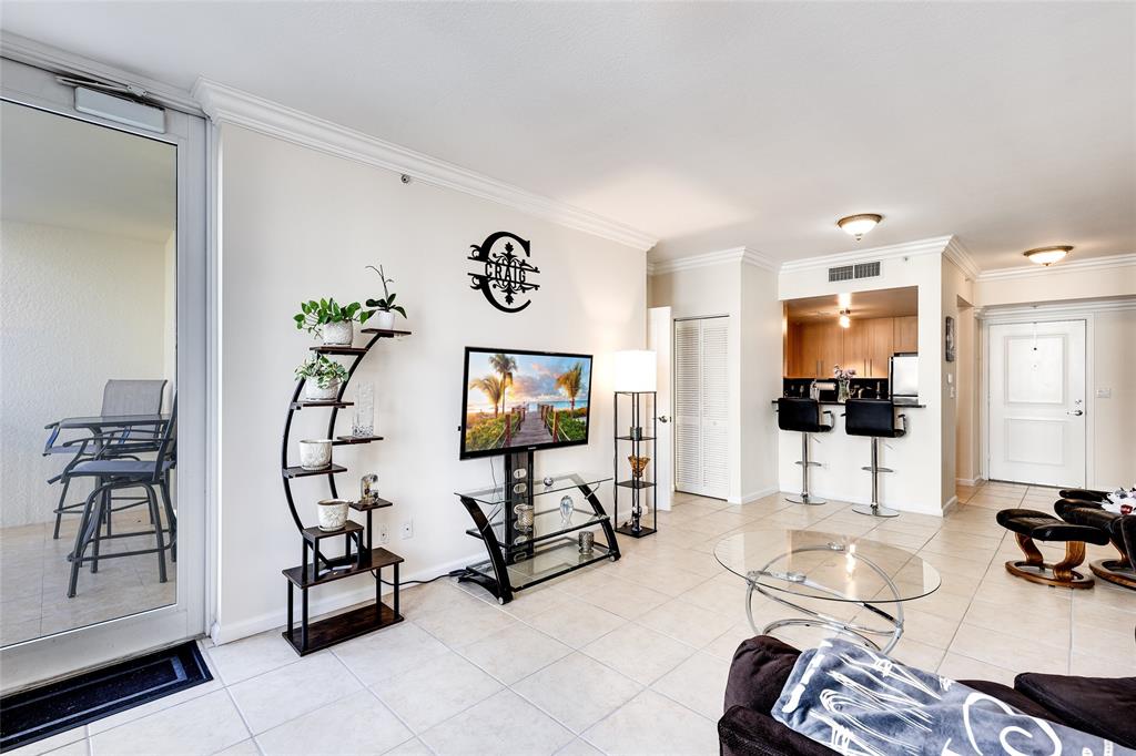 511 Southeast 5th Avenue, Unit 1022 Fort Lauderdale, FL 33301 - Photo 11 of 67 a living room with furniture and a flat screen tv